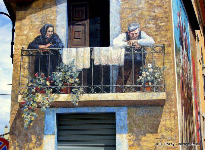 The old couple on the balcony, mural Fonni - Sardinia