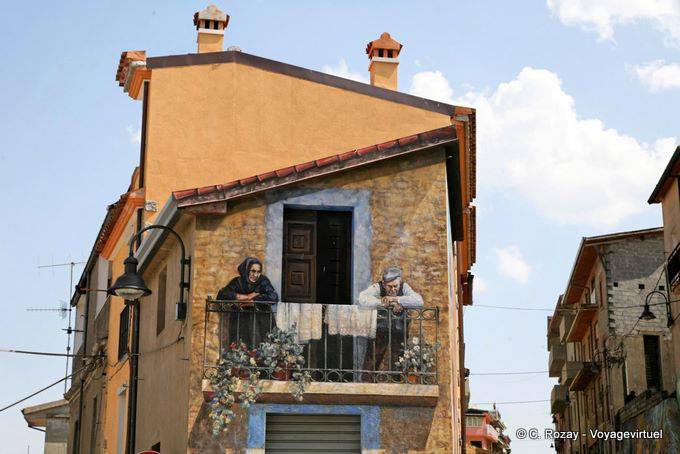 Street corner, balcony trompe l'oeil, mural Fonni - Sardinia