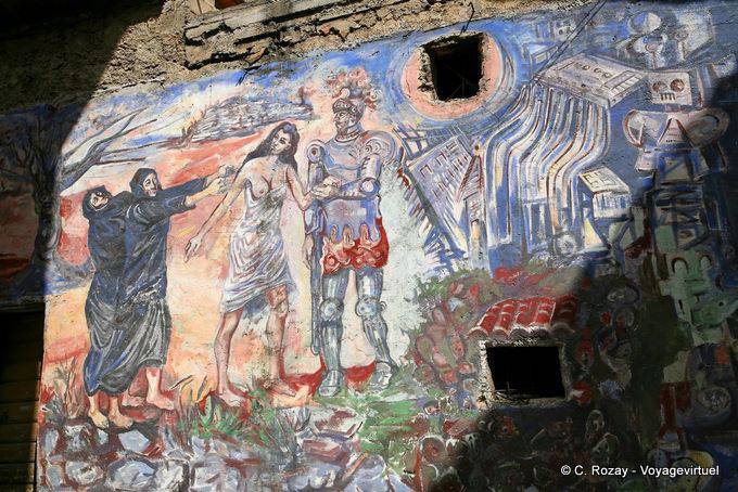 Orgosolo, between the beautiful armor and religion, murals - Sardinia