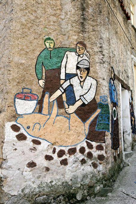 Orgosolo, kill the pig, naive painting of Via Tiziano - Sardinia