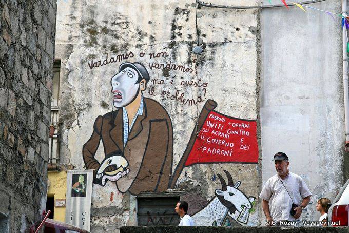 Orgosolo, against government bosses, facade fresco - Sardinia