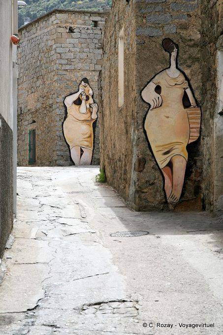 Orgosolo, women painted on the stones - Sardinia