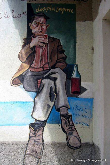 Orgosolo, double flavor tribute to C. Bore, satirist, murals - Sardinia