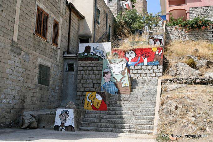 Orgosolo, amusing stairs, murals - Sardinia