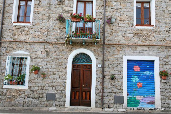 Orgosolo, stone facade at 80 Corso Repubblica - Sardinia