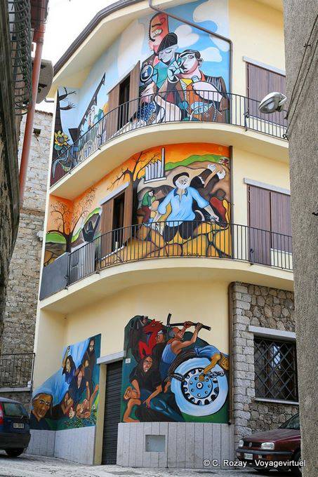 Orgosolo, painted façade of the Biblioteca Comunale - Sardinia