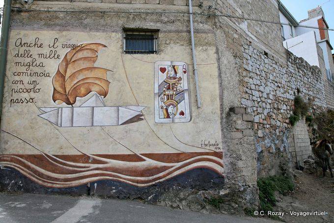 Orgosolo, the journey of a thousand miles begins with one small step, Fortunato, murals - Sardinia
