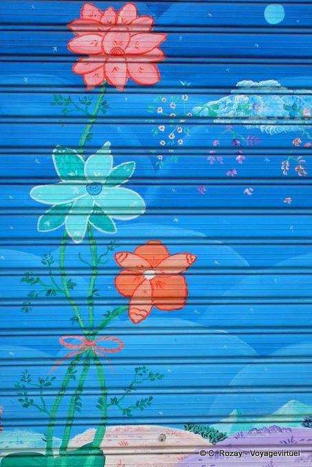 Orgosolo, painted garage door with flowers - Sardinia