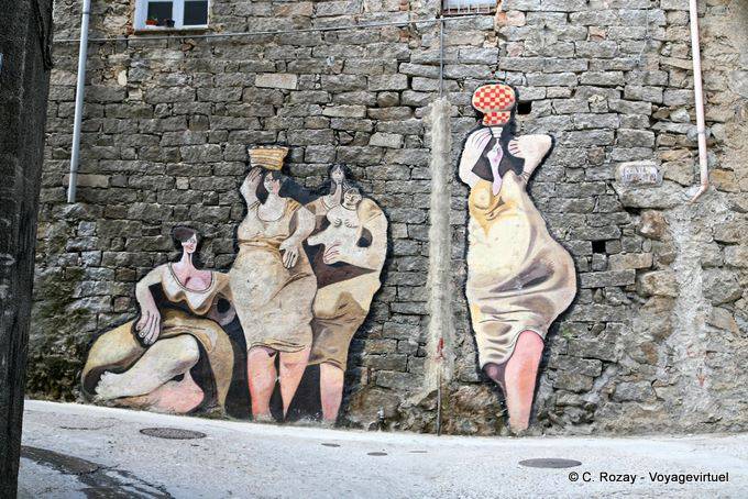Orgosolo, a group of women, Via D'Azeglio, murals - Sardinia