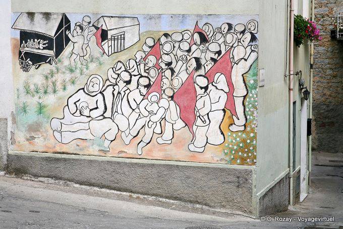 Orgosolo, the event and the red flags, murals - Sardinia