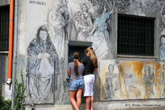 Orgosolo, corso Repubblica, mural around the cash dispenser - Sardinia