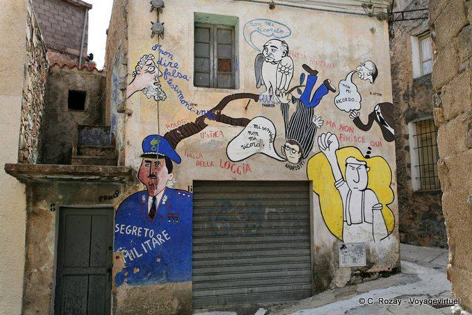 Orgosolo, rumors and military secret, murals - Sardinia