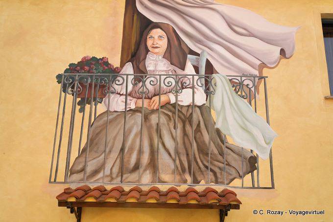 Tinnura, the woman sitting on the balcony, murals - Sardinia