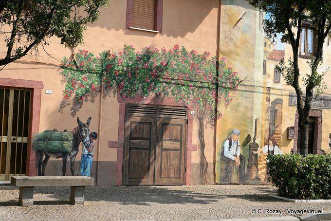 Tinnura, ass on the bench, murals - Sardinia