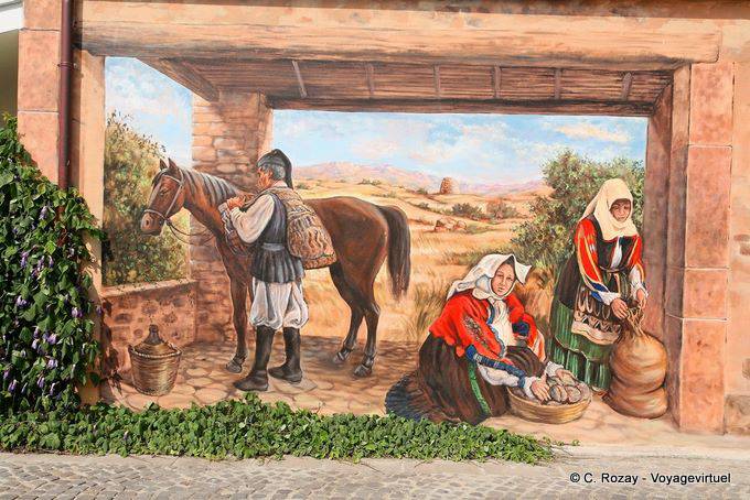 Tinnura, traditional costumes and the nuraghe off, murals - Sardinia