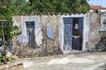 Fonni, the old woman and her hovel, mural, Sardinia.