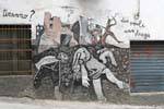 Orgosolo, two people, a massacre, tyranny, murals, Sardinia.