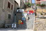 Orgosolo, amusing stairs, murals, Sardinia.