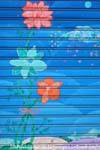 Orgosolo, painted garage door with flowers, Sardinia.