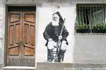 Orgosolo, the old man with the gun, murals via Santa Caterina, Sardinia.
