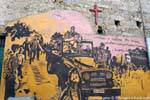 Orgosolo, under the cross, the troops arrived, murals, Sardinia.