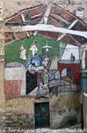 Orgosolo, Via Guhino, local interior, murals, Sardinia.