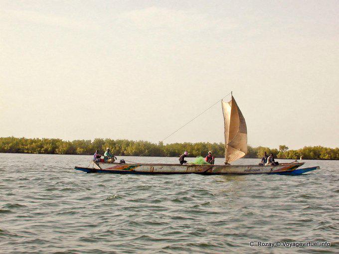 Saloum river boat going up the sail - Senegal