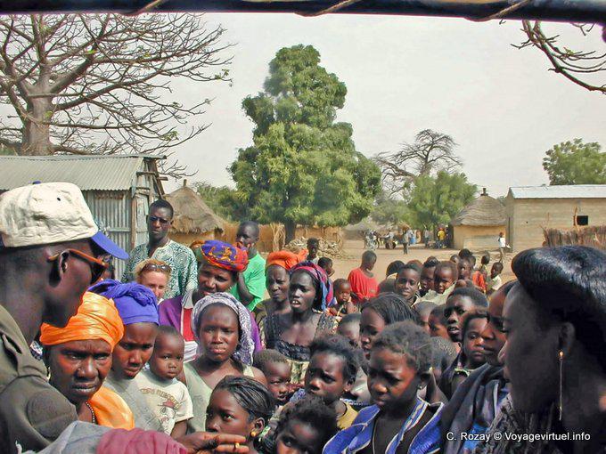 Faces during a distribution of gifts in a village in Saloum - Senegal
