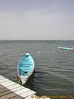 Blue canoe moored on the Saloum, Senegal.