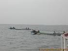Fishermen in the process of navigating the Saloum, Senegal.