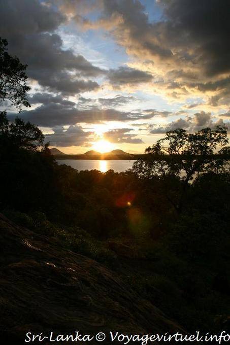 Sun setting between the hills, Kandalama, Dambulla - Sri Lanka Ceylon