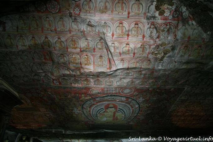 Painted ceiling of the cave Buddhist figures, the Golden Temple of Dambulla - Sri Lanka Ceylon