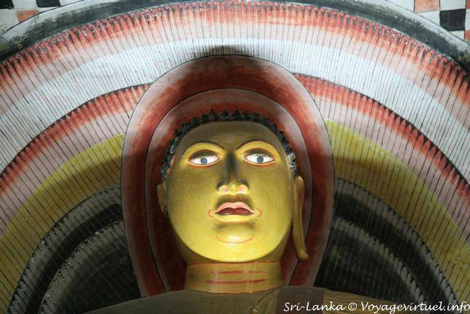 Regard the Buddha in rainbow sky Maharajalena Cave, Golden Temple, Dambulla - Sri Lanka Ceylon