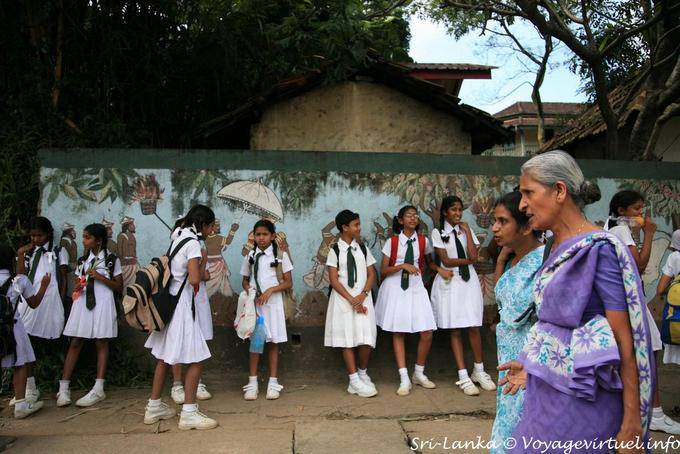 Girls in uniform at the exit of the school, Kandy - Sri Lanka Ceylon