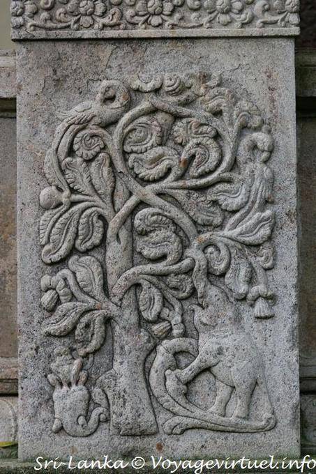 Elephant attacking a stylized tree, bas-relief, Dalada Maligawa, Kandy - Sri Lanka Ceylon