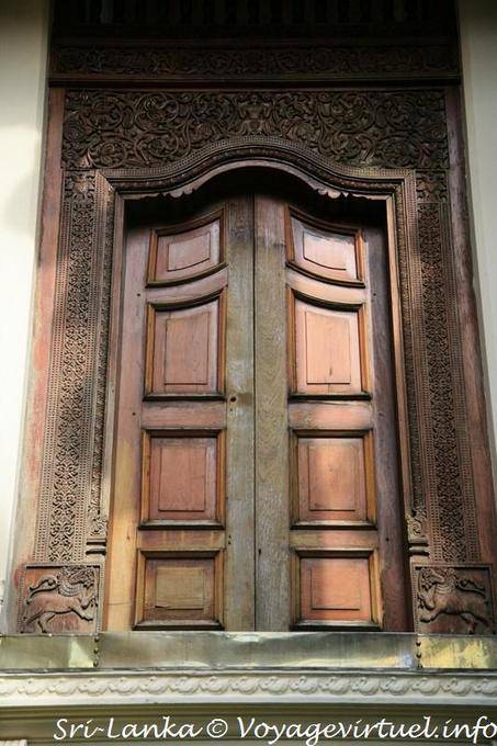 Entourage outside of finely carved door, Temple of the Tooth, Kandy - Sri Lanka Ceylon