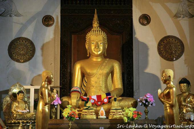 Golden Buddha posture Taking the earth to witness, Temple of the Tooth, Kandy - Sri Lanka Ceylon