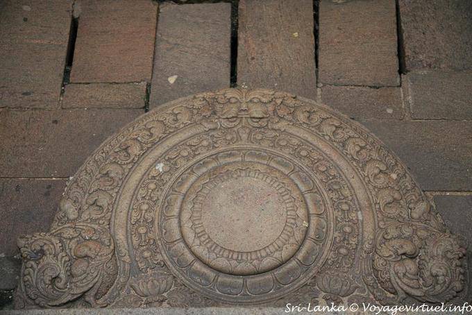 Moonstone Moonstone or an entrance to the main temple, Dalada Maligawa, Kandy - Sri Lanka Ceylon