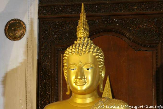 Portrait of golden buddha, Palace of the Tooth Relic, Kandy - Sri Lanka Ceylon