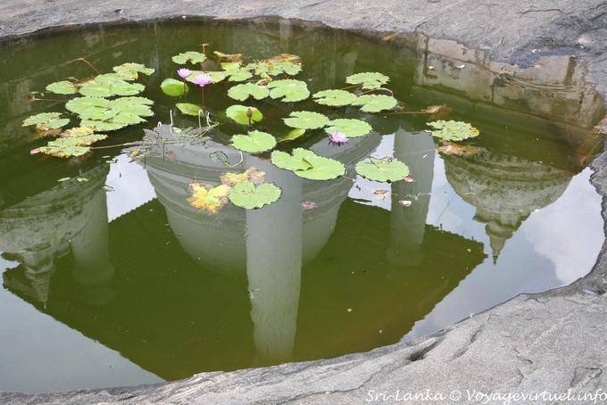 Reflecting the main dagoba covered in the pond, Gadaladeniya, Kandy - Sri Lanka Ceylon