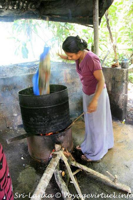 Soaking in boiling water to remove the wax, making batik, Matale - Sri Lanka Ceylon