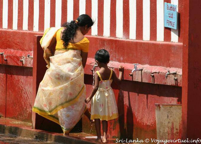 Foot washing for Indian Tamils, Hindu Temple Matale - Sri Lanka Ceylon