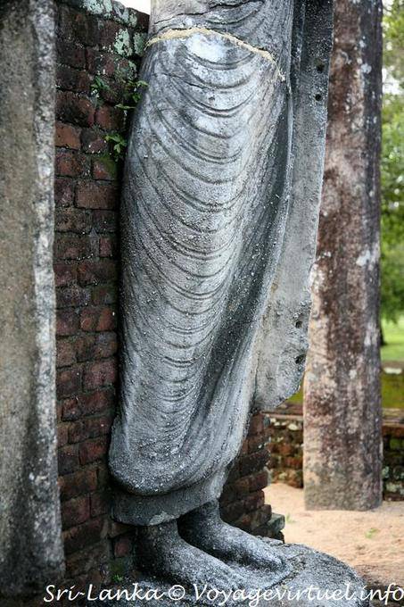 Feet and lower part of the standing Buddha, Temple Medirigiriya - Sri Lanka Ceylon