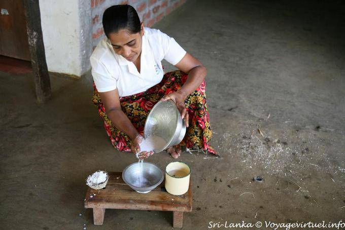 Milk separation and pieces of shredded coconut, Nalanda - Sri Lanka Ceylon
