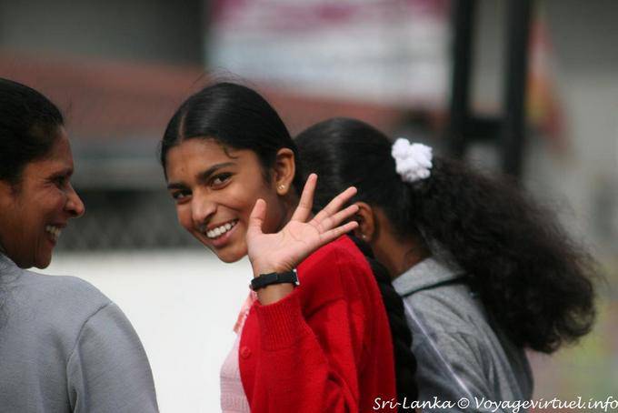 Friendly gesture of a girl in the street, Nuwara Eliya - Sri Lanka Ceylon