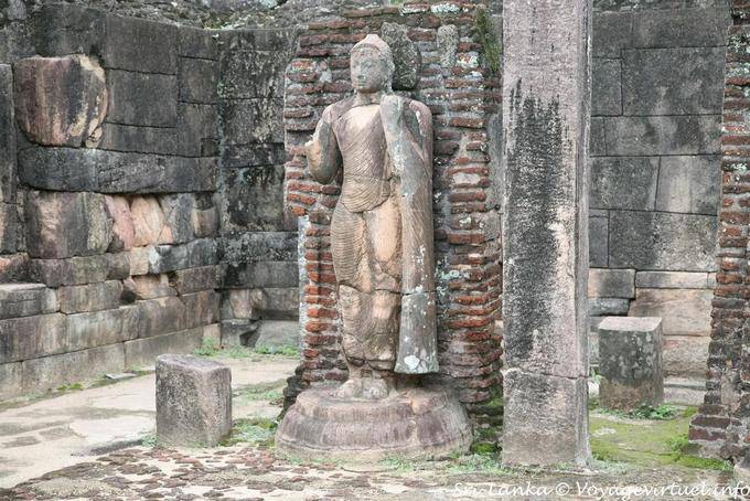 Buddha standing on the terrace of the tooth or Hatadage, Polonnaruwa - Sri Lanka Ceylon