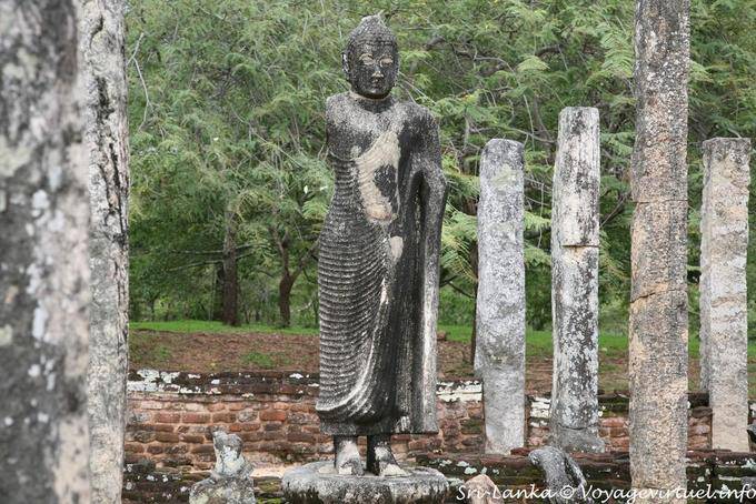 Buddha standing in the middle column, Terrace of the Tooth, Polonnaruwa - Sri Lanka Ceylon