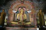 Buddha under the arc of the Dragon, Maha Viharaya Alut, Golden Rock Temple, Dambulla, Sri Lanka Ceylon.