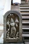 Stone stele carved at the foot of a staircase, Temple of the Tooth Relic, Kandy, Sri Lanka Ceylon.