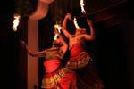 Lined with fire-eaters, jugglers flames, Kandy, Sri Lanka Ceylon.